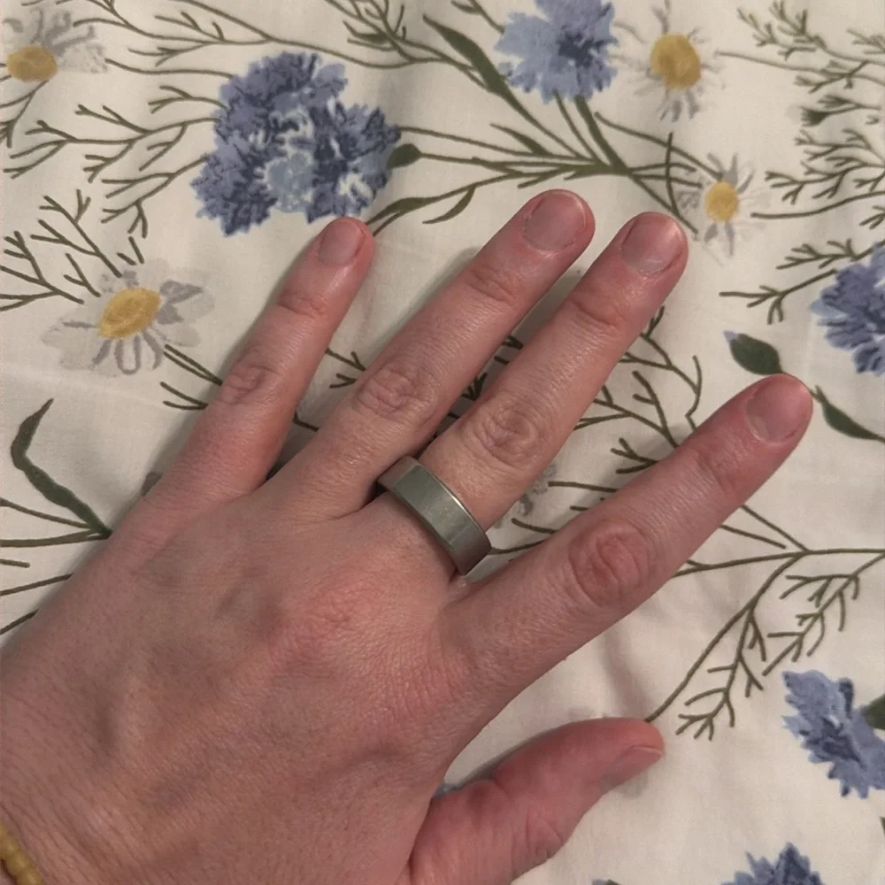 Oura ring 4 size 10 brushed silver finish. Charger included
